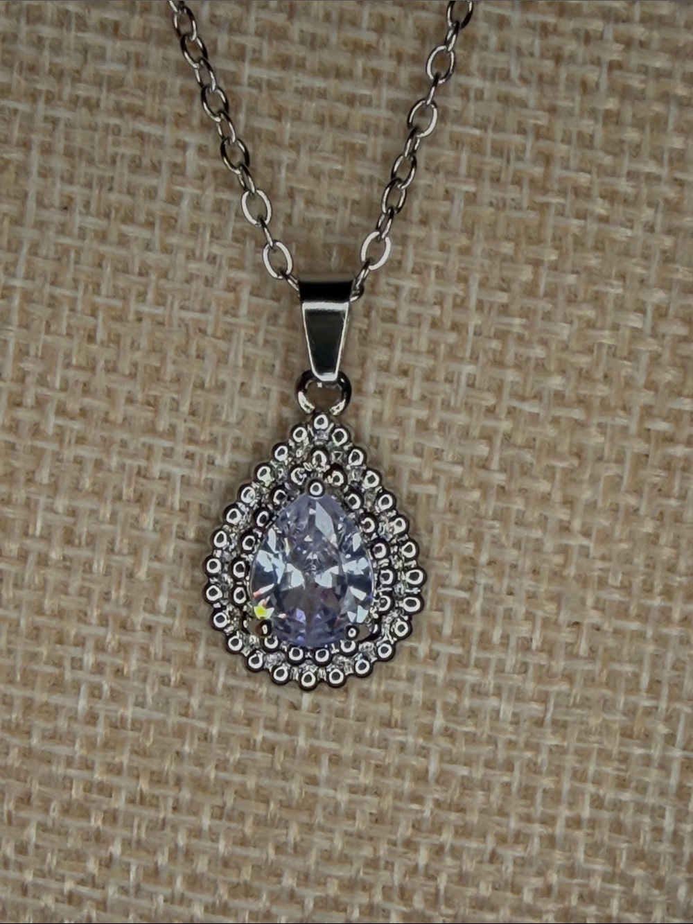Silver Tone Teardrop Pendant Necklace with Clear Stone